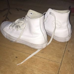 Lightly worn leather converse